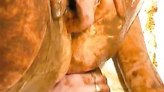 Licking the tip of a shitty dildo