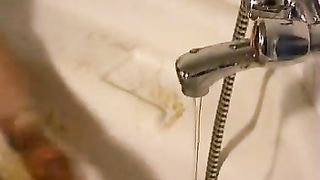 Licking the tip of a shitty dildo