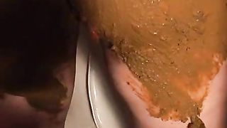 Rubbing fresh crap on her entire body