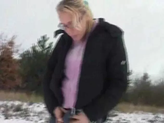 Sexy blonde shitting on the snow