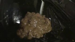 Rubbing liquid scat on her entire body