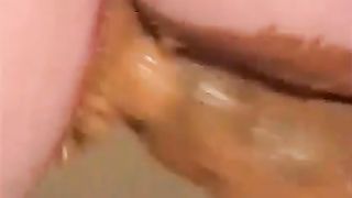 MILF masturbating with a dildo