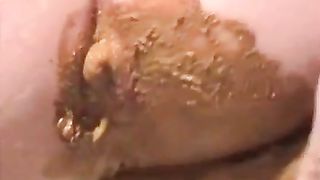 MILF masturbating with a dildo