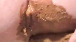 MILF masturbating with a dildo