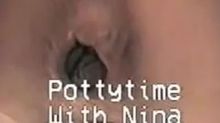Hot MILF pooping in a potty