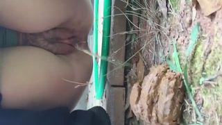 Peeing on a big pile of shit