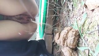 Peeing on a big pile of shit