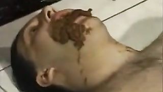 Pooping on her young slave