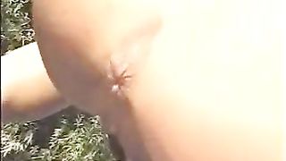 Slim girl shitting outdoor