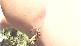 Slim girl shitting outdoor