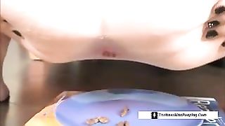 Tiny piece of shit on a blue plate