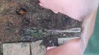 Hot babe peeing in public