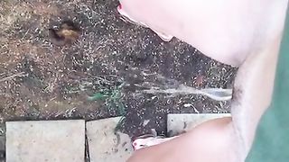 Hot babe peeing in public