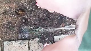 Hot babe peeing in public
