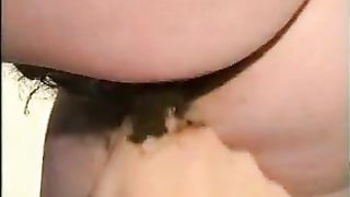 Vintage video of a mature woman eating crap