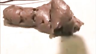 Big brown turd on a homemade toilet