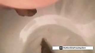 Pulled down her pink panties so she can poop