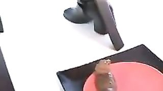 Perfect turd on a red plate