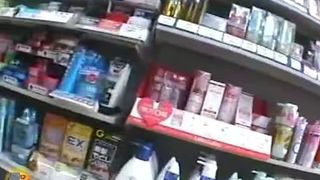 Shitting in a public bathroom in a supermarket