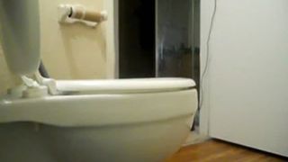 Tattooed ebony girl pooping