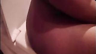 Tattooed ebony girl pooping