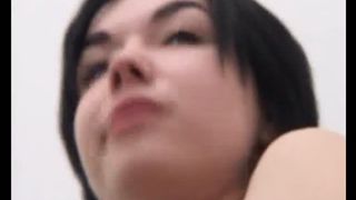 Brunette MILF pooping in the bathtub