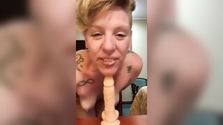 Man makes a woman squat and shit on a statue