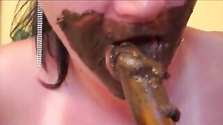 Slut eats her own shit while sitting on a bed