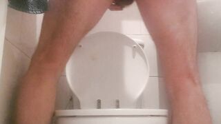 Girl takes a huge shit in the toilet