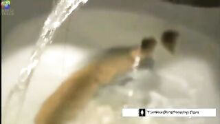Chick plays with her shit in the toilet