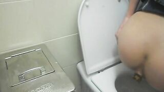 Elena shits in a public toilet and wears a white thong