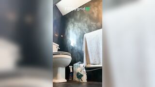 Girl lays on shit in the bathroom