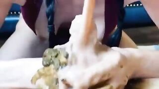 Woman eats a huge shit from another woman's ass