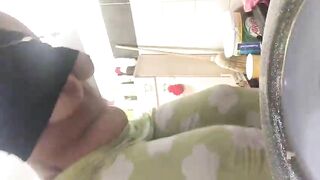 Woman takes a shit on a toilet