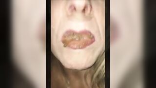Woman takes a mouthful of warm shit