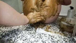Girl uses toilet bowl to take a huge shit on the kitchen counter