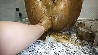 Girl uses toilet bowl to take a huge shit on the kitchen counter