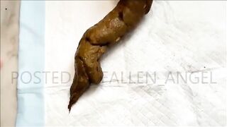 Blonde girl takes a huge shit on the bed