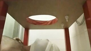 Woman spreads her asshole with her fingers in the shower