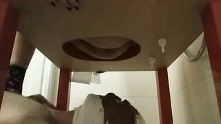 Woman spreads her asshole with her fingers in the shower