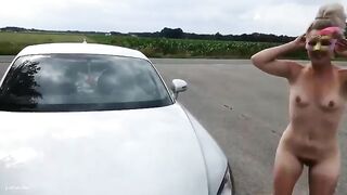 Babe takes a shit on car windshield while squatting