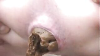 Girl pulls fresh shit out of her ass in the woods