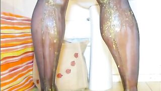 Woman stands on toilet and shits all over her legs