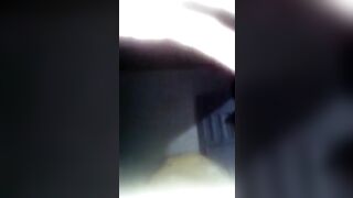 Girl spreads her ass cheeks while sitting on a pile of shit