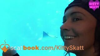 Girl with a purple headband squats and takes a huge shit in a toilet