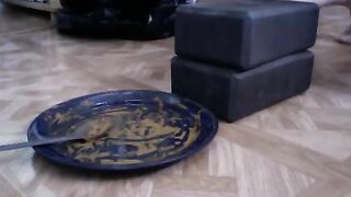 Girl in black mask takes a massive shit in a plate