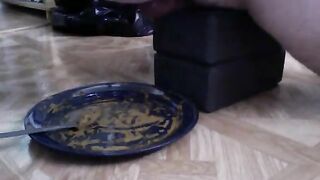 Girl in black mask takes a massive shit in a plate