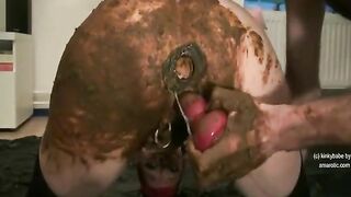 Busty slut getting covered in shit and toyed