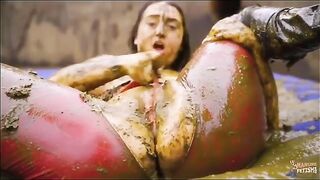 Busty babe masturbates in the manure pool