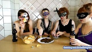 Girls in masks share a plate of shit and chips